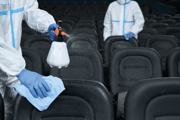 Team member conducting a post-treatment follow-up